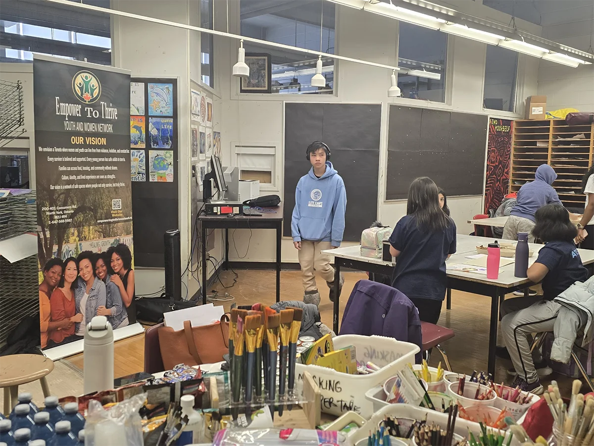 Art brushes, paints, and workshop supplies in the studio space