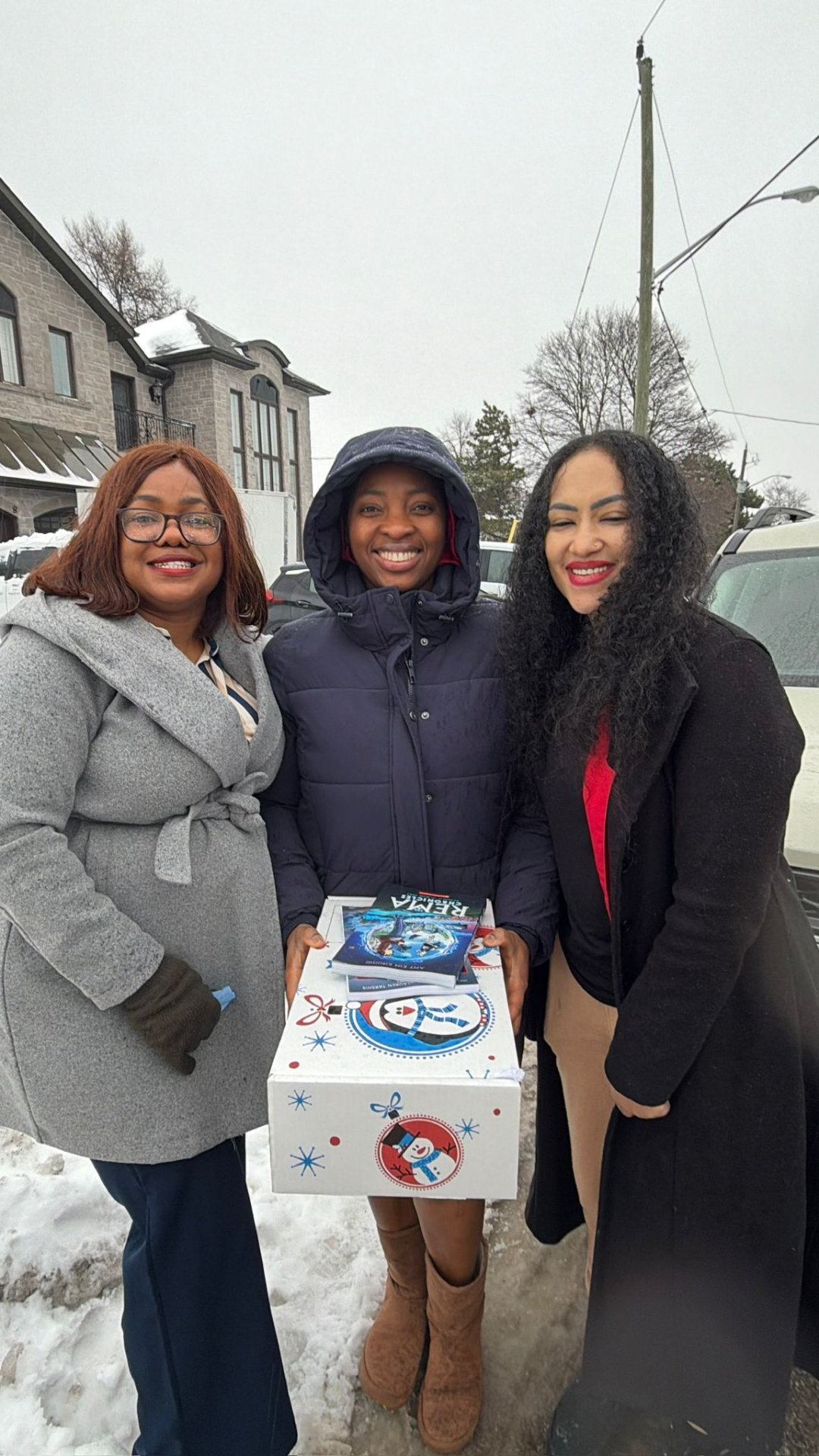 Empower To Thrive team delivering seasonal packages to local Toronto families